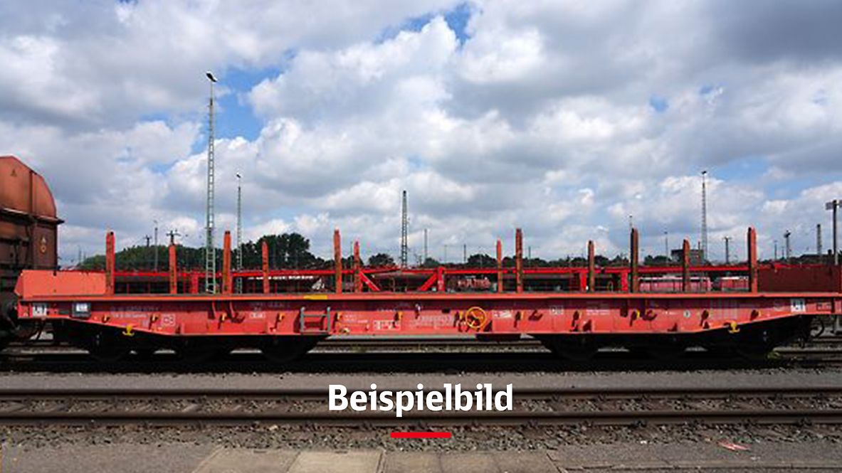 Roter Güterwaggon mit der Bildunterschrift "Beispielbild"