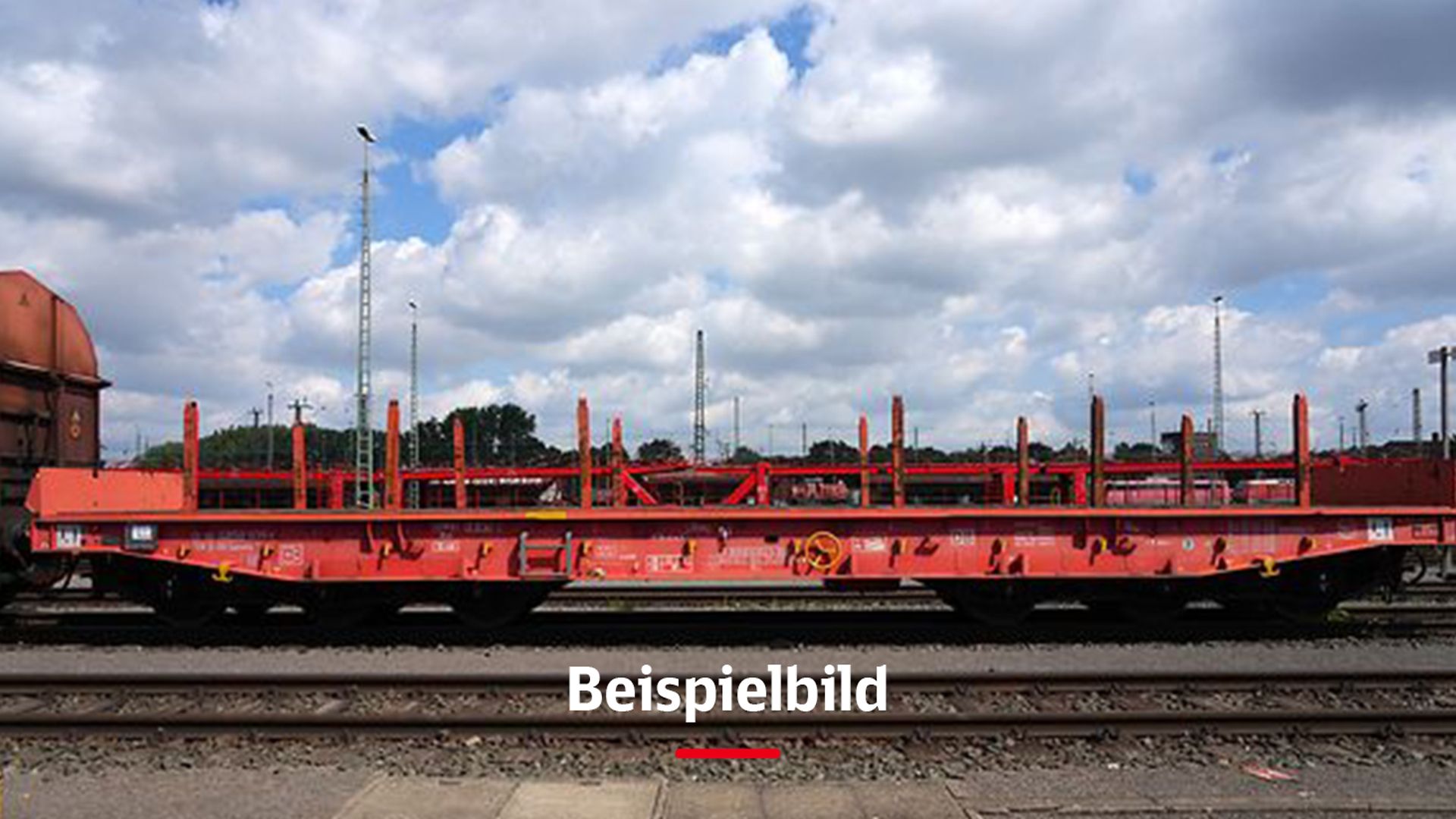 Roter Güterwaggon mit der Bildunterschrift "Beispielbild"